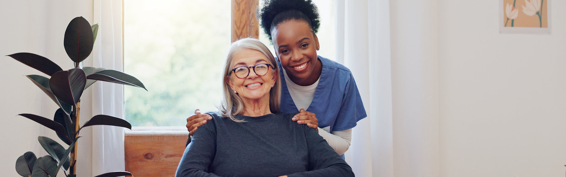 nurse and old woman with wheelchair